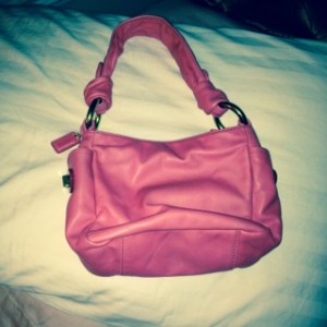 The impulse purchase of a bubble-gum pink Coach bag which I never use... Don't ask how much it cost!